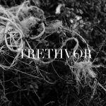 Black and white photograph of tangled seaweed and rope with title text 'Trethvor' in white in the middle of the image.