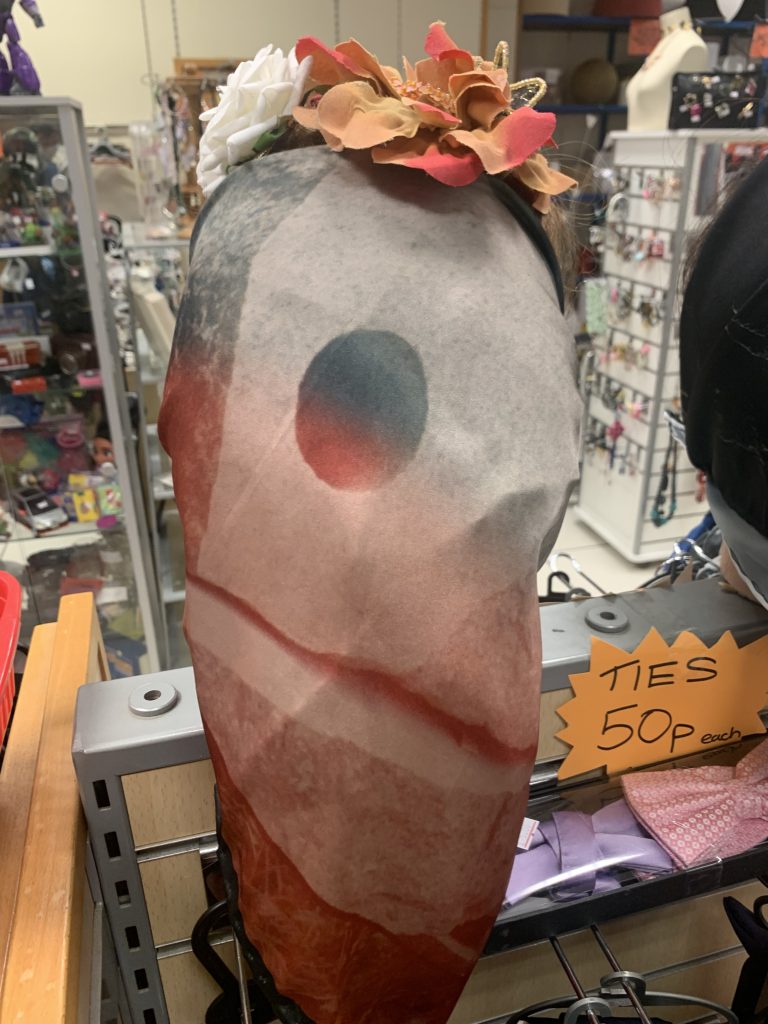 Installation shot, Second Hand Part 1, scarves on charity shop mannequin.